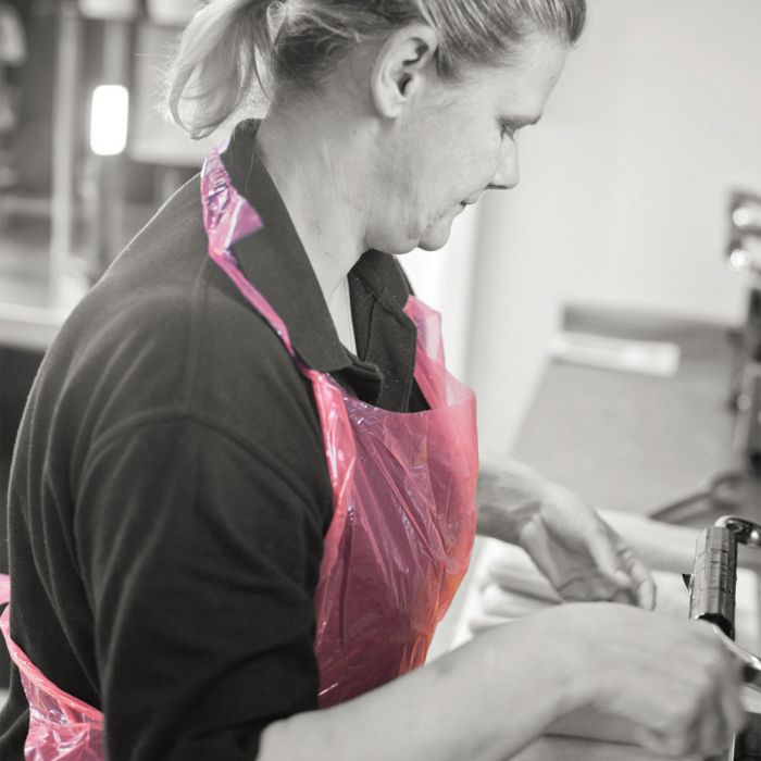 Shield® Pink Medium Duty Aprons on a Roll ‑ 27" x 46" - roll of 200