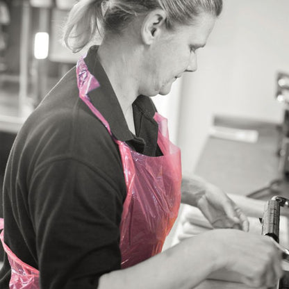 Shield® Pink Medium Duty Aprons on a Roll ‑ 27" x 46" - roll of 200