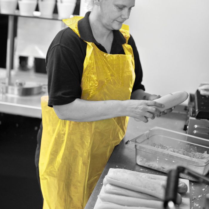 Shield® Yellow Disposable Aprons on a Roll ‑ 27" x 42" - Roll of 200